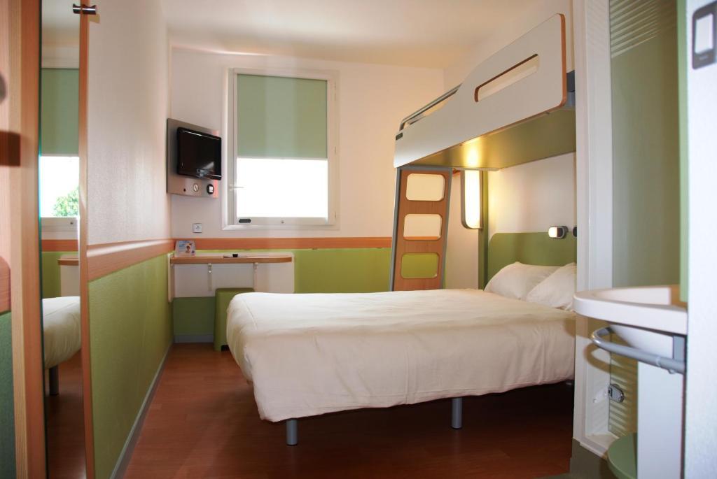 Ibis Budget Roanne Hotel Rum bild